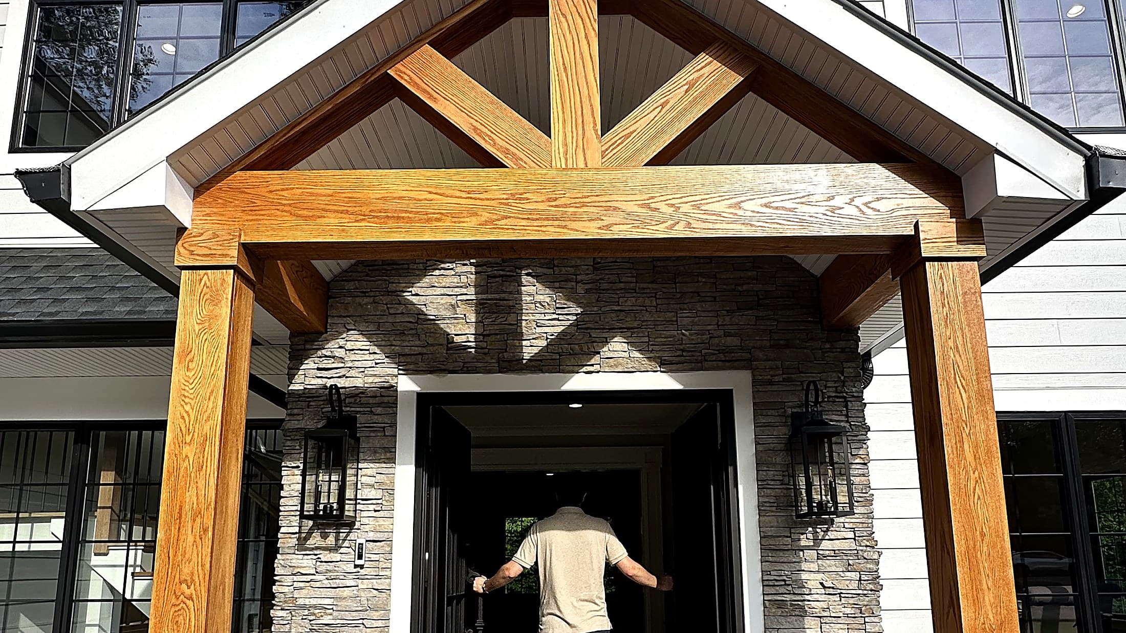 Custom timber-frame entry of a Bergen County home